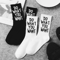 two pair of socks that say "do what you want"